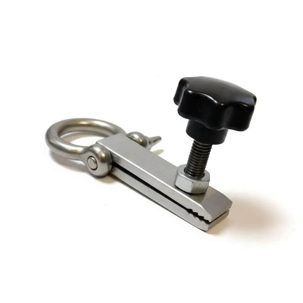 Close-up of the aggressive gripping teeth on the mini clamp