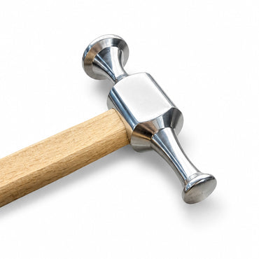 Vibration-dampening ergonomic seasoned wood handle on professional PDR INOX auto body blending hammer.