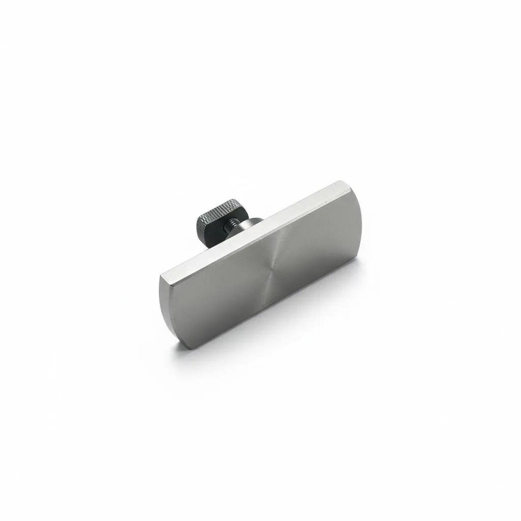 Elongated stainless steel PDR tab pulling a vehicle crease