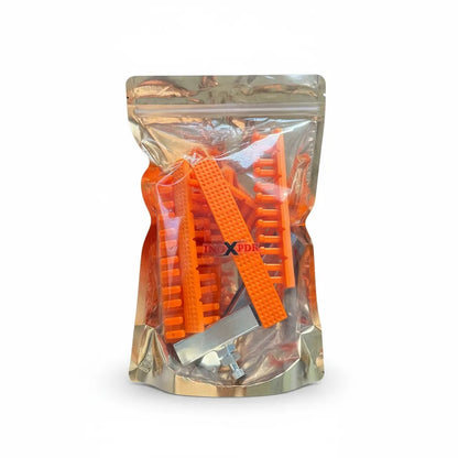 Hot glue application on the ribbed base of a centipede tab