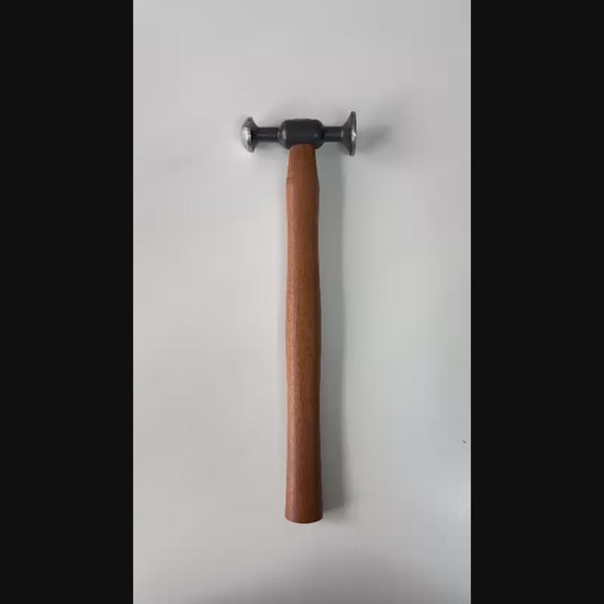 Technician performing rapid tapping with the Model 3 hammer