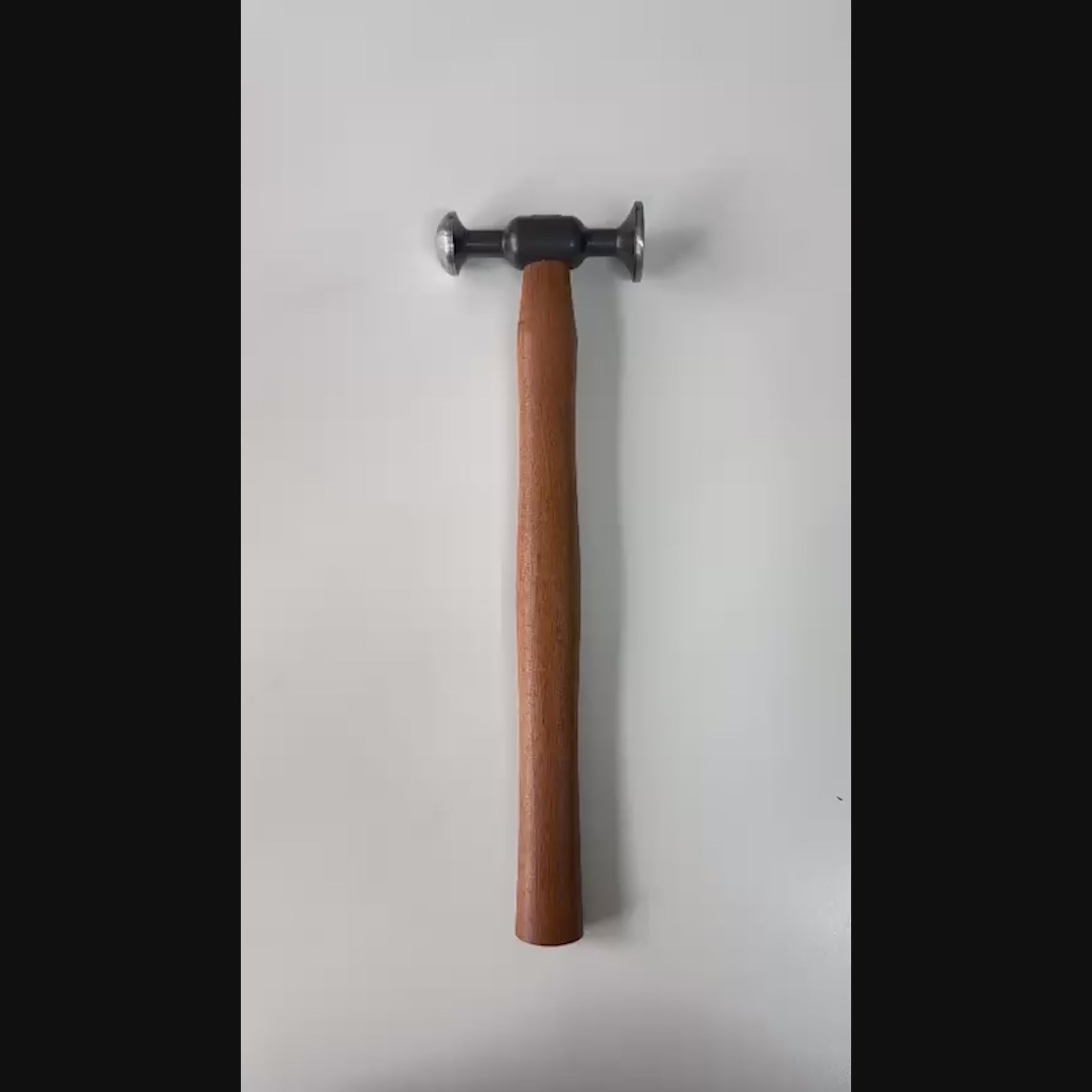 Technician performing rapid tapping with the Model 3 hammer