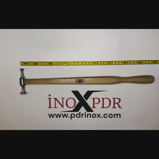 Technician blending a dent with the ergonomic PDR INOX hammer