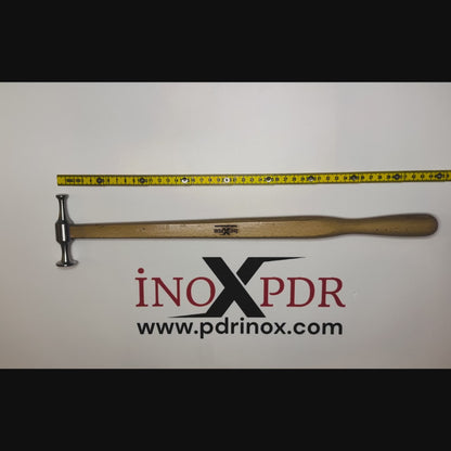 Technician blending a dent with the ergonomic PDR INOX hammer