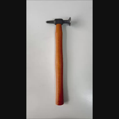 Auto body technician blending a dent with Model 6