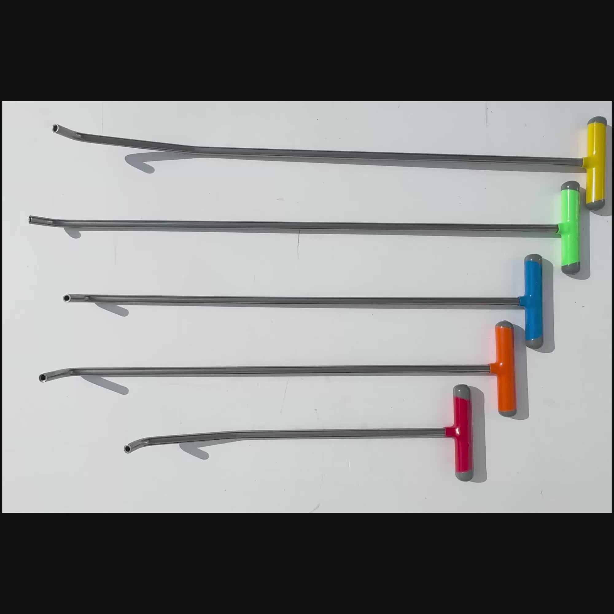 PDR technician selecting an Orvanta rod for complex repair