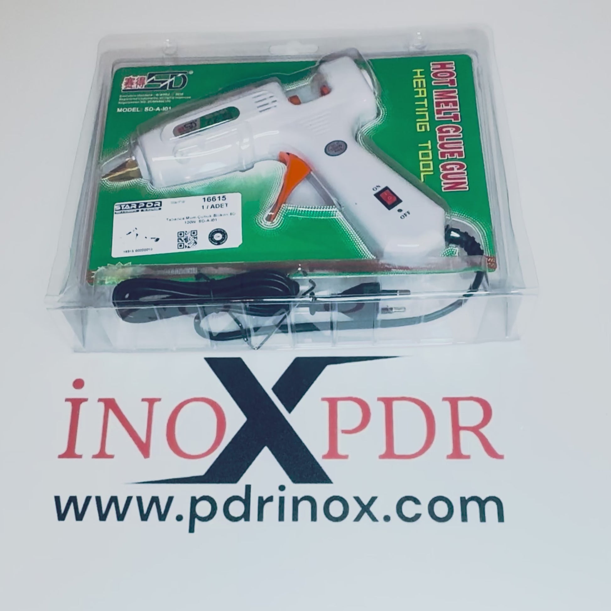 Close-up of the precision nozzle applying hot glue to a PDR tab