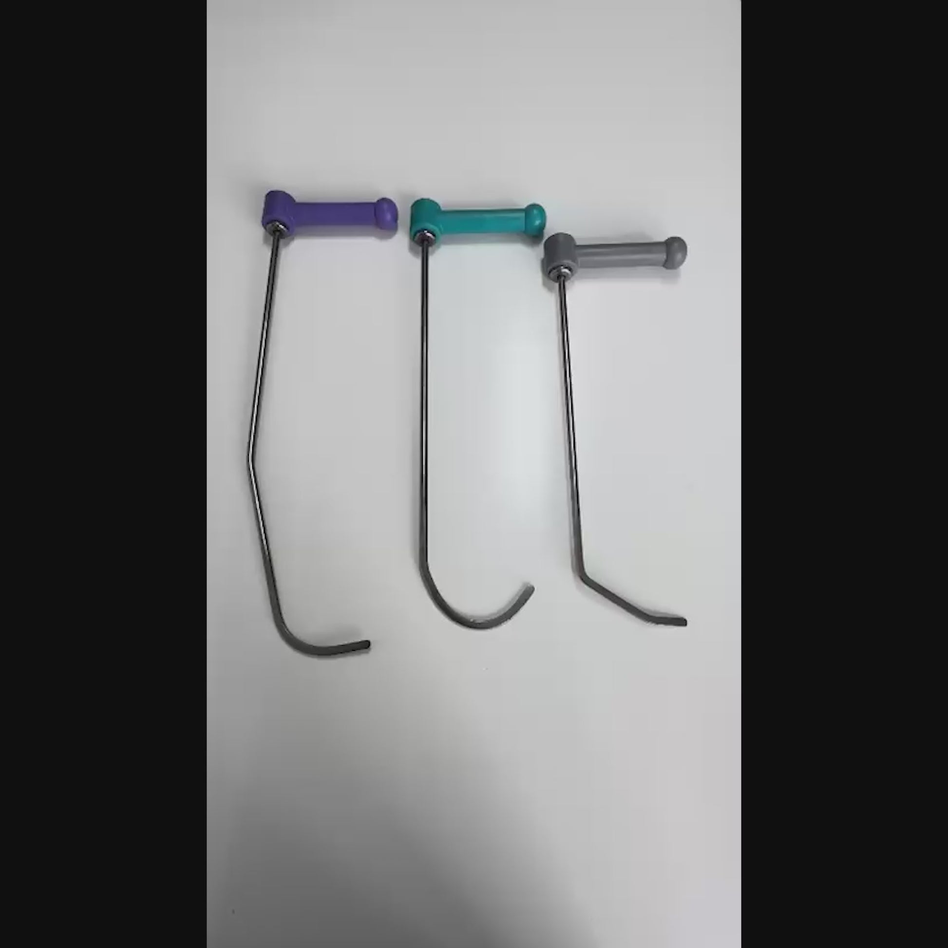 Professional technician using an Amasya series PDR rod