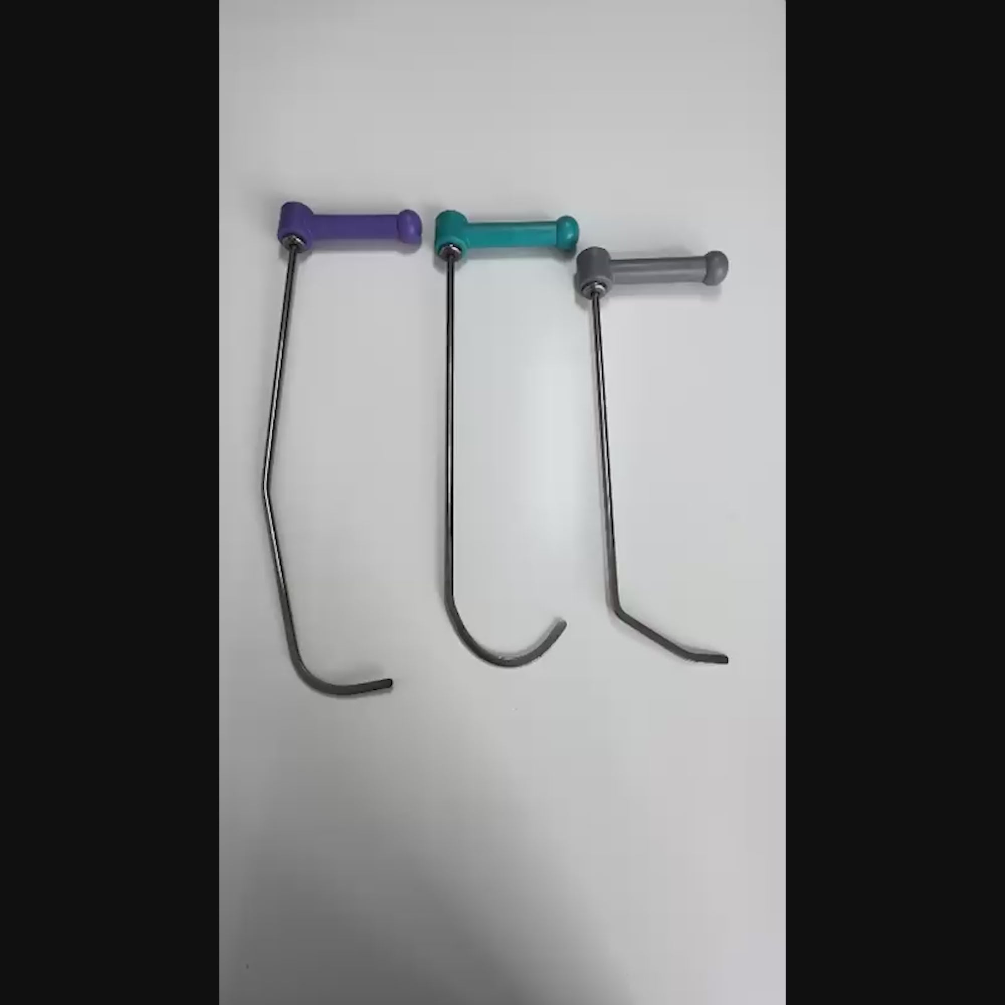 Professional technician using an Amasya series PDR rod