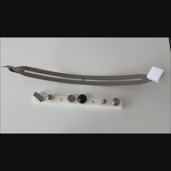 Detailed view of the hand-crafted steel body on the 75cm stick