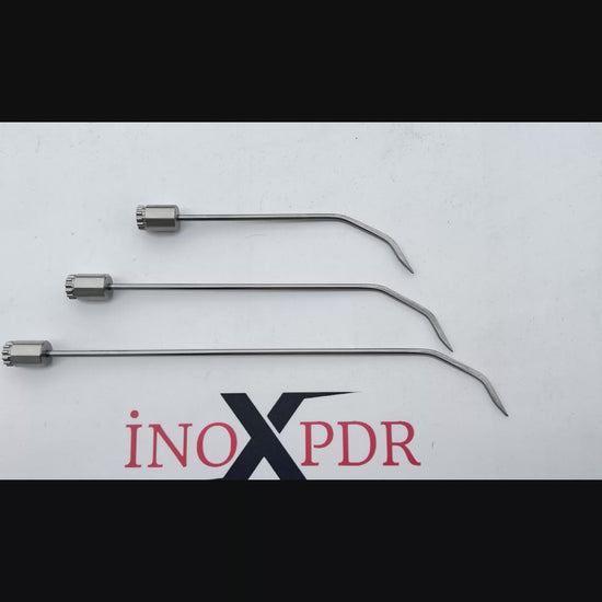 Auto body technician utilizing the rotatable Milano PDR tool