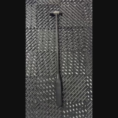 Technician changing a tip on the carbon fiber PDR hammer