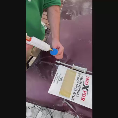 Gold hot melt glue applied to a PDR pulling tab