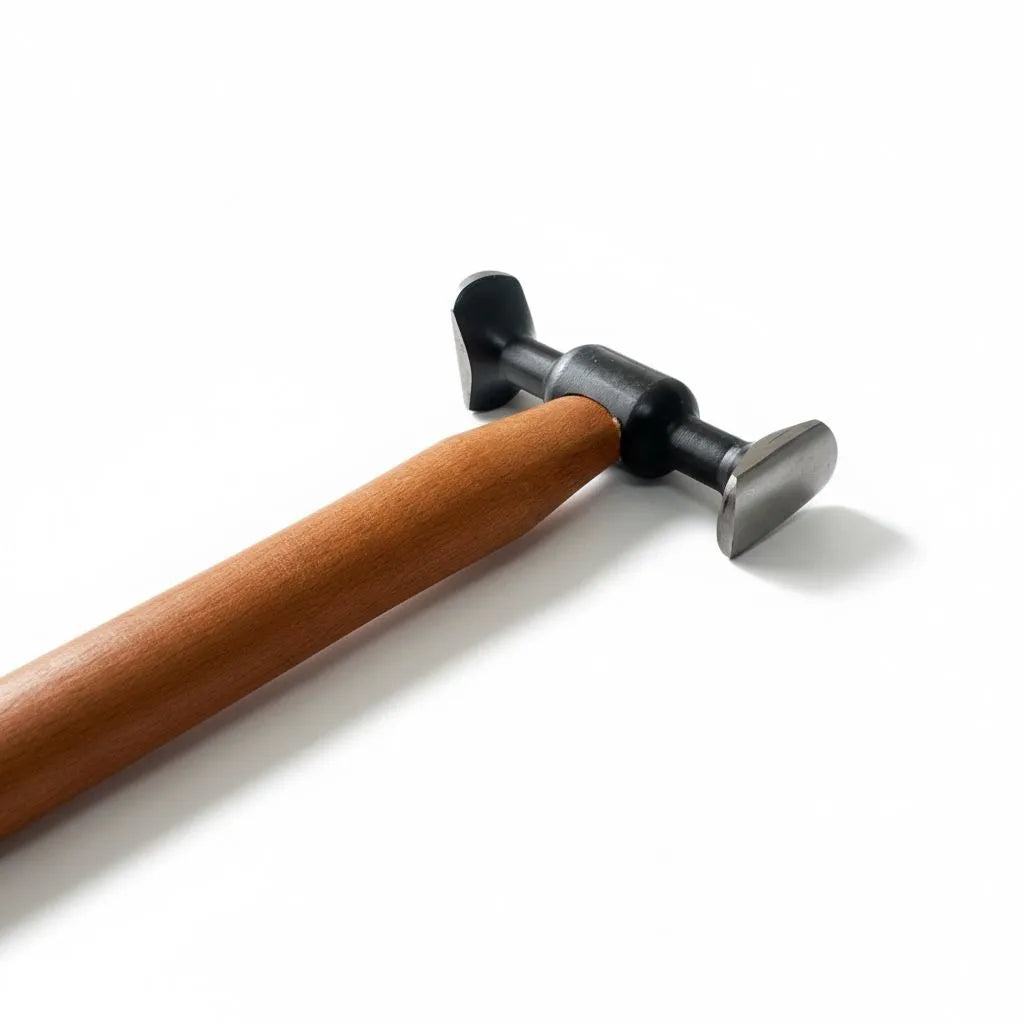 Close-up of the Model 7 steel PDR hammer head