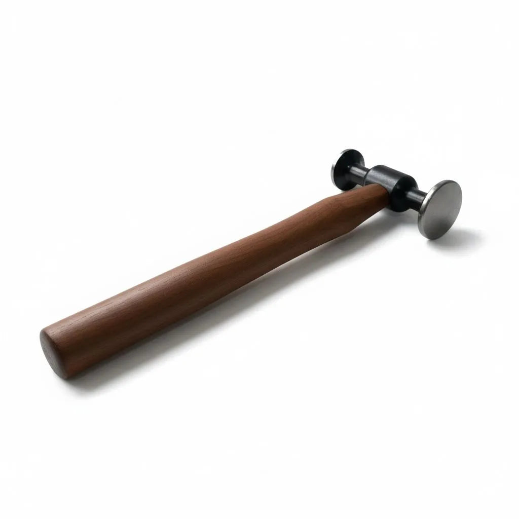Close-up of the steel tapping head on the Model 3 hammer